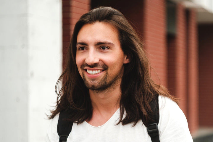 Man with long hair and neat beard