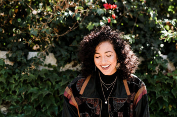 Girl with shiny and curly hair